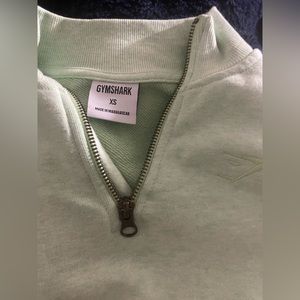 Mint green XS gym shark half zip. Barley warn in perfect condition.